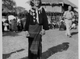 Local people in Burma near the 797th Engineer Forestry Company--A Kachin girl dress for Christmas on December 25, 1944, in Burma.  During WWII.