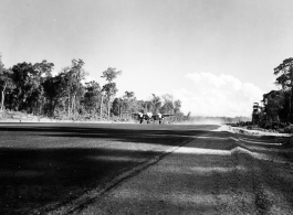 A P-38 on an airstrip in Burma.  Aircraft in Burma near the 797th Engineer Forestry Company.  During WWII.