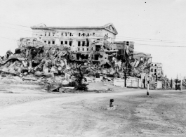 A bomb-damaged government building in Manila after the Japanese occupation of the Philippines. It is unknown how this got into Schuharts collection as a member 2005th Ordnance Maintenance Company, as he should have returned to the US via the Atlantic, and thus with no stopover in the Philippines.