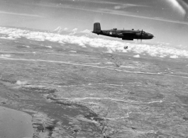 American bombing using incendiary bombs at Monywa, Burma via B-25s of the 22nd Bombardment Squadron during WWII.