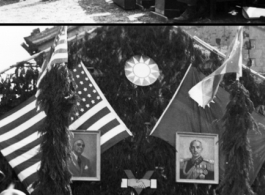 Burma Road dedication ceremony in Kunming, China, on February 4, 1945, during WWII. Review of first convoy (or one of the first convoys) to reach China. General view of the stage and reviewing party, with American and Chinese dignitaries, soldiers, and civilian VIPs. An American band plays, and an honor lines on both sides of the center carpet stand in formation.  Official dignitaries at the ceremony included, on the Chinese side, such figures as General Lung Yun, Governor of Yunnan Province,  Gen. Wang Yu-