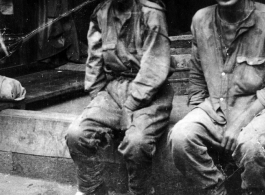 Two Japanese POWs caught on the Burma Road, near Baoshan. During WWII.