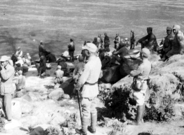 Chinese troops are river crossing in Yunnan province during WWII.