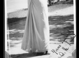 A woman in India, dressed in a sari. 