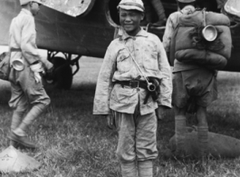 Due to the urgent need for reserve troops in the Lungling offensive, Chinese troops of the 200th Div., Chinese 5th Army, board a C-47 plane enroute to Paoshan (Baoshan).   Yunnanyi, China. 9/15/44