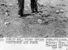 Japanese hoped to destroy personnel and equipment at the former Fourteenth Air Force base at Liuchow, but American soldiers have equipment with which to safely remove the mines. Liuchow was recaptured on 30 June, 1945.