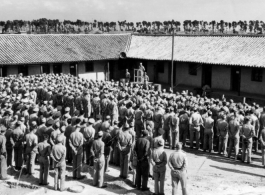 American servicemen listening to a speech in Yunnan province, probably near the 14th Air Force HQ outside of Kunming. 