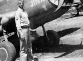 Kenneth Williams in Kunming with a fanged P-40 named 'Jinx'.