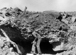 A battle-blasted bunker or pillbox in China, probably in Tengchong, during WWII.