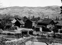 A village near Yangkai and local people in Yunnan province, China.  From the collection of Eugene T. Wozniak.