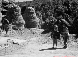 Local people in China: Kids in a village in China during WWII.