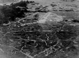 Interdicted by the Flying Tigers since they evacuated on November 7, 1944, the former 14th Air Force advanced base at Liuchow (Liuzhou), vital railroad and highway junction in central Kwangsi (Guangxi) and in the path of general Japanese withdrawals from the Lung Valley and Siang corridor that end the Japanese dreams of a Greater East Asia land line from Singapore to the Empire.  No activities indicated in the Taipigg passenger rail terminal yards, left center, although approximately 60 damaged and probably