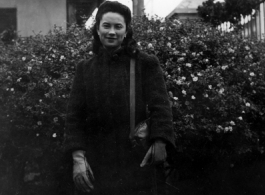 Local people in Yunnan province, China: An elite woman poses for the camera during WWII.