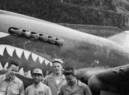 T.T. Hale, S. Seidler, G. Feldman at Guilin (Kwelin) base, in Guangxi province, China, during the Second World War in front of a P-40.  Selig Seidler was a member of the 16th Combat Camera Unit in the CBI during WWII.