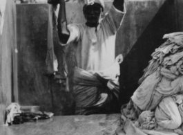 Worker in laundry in New Delhi, during WWII.  Photo by Walt Johnson.