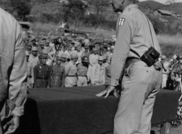 Major General H. C. Davidson, Commander of the 10th Air Force in India, addresses Chinese troops somewhere in Burma. January 28, 1945.