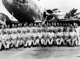 Officers of the 61st Air Service Group in Shamshernagar, India in August 1945, posing before the C-47 "Regina the Queen".  10 Army Air Force.