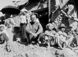 The Burma Surgeon, Gordon Seagrave, returns to his hospital in the jungles of Burma, welcomed by both local children and a GI (on far right). During WWII.