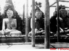 Buddhist statues at Mogong, Burma, outside destroyed temple. During WWII.