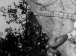 A Kachin fighter in a tree in northern Burma.  Photo from Jim Fletcher.