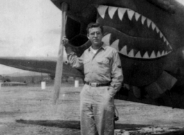 A GI with a P-40 fighter in the CBI during WWII.  Photo from J. Ellis Wood.