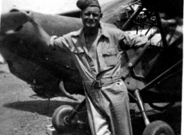 M/Sgt. Ed Smith leans on the prop of a L-5-B at home base at Kalikunda, India, shortly after arrival in December, 1944.  In the CBI during WWII.