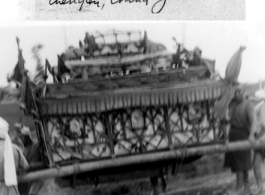 Casket in funeral procession. Chengdu, China, June 1945.