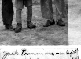 Timmons and Nelson with Chinese kid in soldier's uniform, Hostel #3 near Kunming, October 1945.