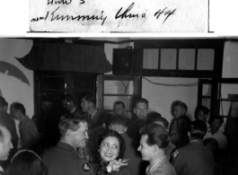 Cpl. Colombo tries to cut in on Chennault at a dance in Hostel #3 at Kunming, China, 1944.