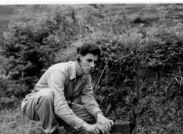 A GI uses an electronic device in the field in the CBI during WWII. Photo from Cebelali.