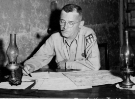 An American officer at his desk in the CBI during WWII.