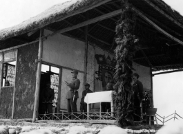 Chinese Lt. General Du Yuming, Nationalist 5th Corps (第五集团军总司令兼昆明防守司令杜聿明), makes speech during rally. Gen. Wei stands behind him.