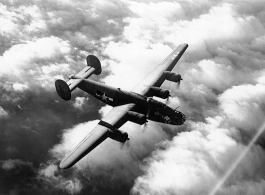 B-24s in flight in the CBI during WWII, including "The Goon" (tail #124183) in the top image.