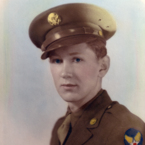 John Gerber in uniform and with Army Air Forces WWII Shoulder Patch, in hand-colored image.