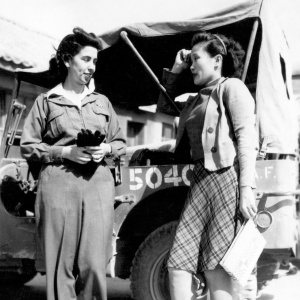 Alice Kim Chong (1909-1972) was one of Claire Chennault’s two female interpreters at Kunming between 1943 and 1945.  Here they are outside the HQ building at Kunming in 1943.  Eloise Witwer, Alice’s roommate and best friend, at left.  Alice Kim Chong (1909-1972) at right.