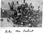 Crowd surrounds American jeep in Futsi Mio District, Nanjing, November 15, 1945.