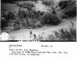 September 14, 1944  Long shot of 150MM Krupp Howitzer gun, 10th Artillery Regiment 11th A/G, firing on Lungling.  Photo by Pvt. W. E. Shemorry.  In Yunnan province, China (CBI), in WWII.