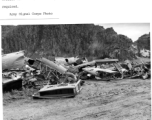 Engineers scavenge parts at Guilin (Kweilin) Air Field in a boneyard of parts of American military aircraft during WWII.  Army Signal Corps photo.