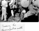 "Crossing the Brahmaputra with all our possessions--two duffle bags each, three years of living items."  In the CBI during WWII.