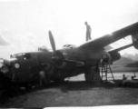 A B-25 after crashing in southern China, in Guangxi province, being salvaged.