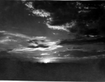 Tents for GIs at the American base at Liuzhou during WWII, silhouetted against the sunset.