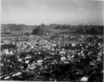 Aerial view of Liuzhou, Guangxi, China, during WWII, showing the break-neck post-occupation recovery and rebuilding after the Japanese retreat. 1945.