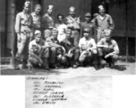 Chinese infirmary staff with American soldiers. Image taken in front of a Chinese infirmary in a compound.