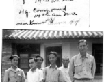 Sgt. Parker and staff of coffee shop (in rear), near Kunming, China, 1944.