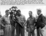 American GIs examine small Japanese fragmentation bomb in China on November 13th, 1942.  2nd Lt. Nicholas Marich (sometimes spelled Marick) and 2nd Lt. Joseph W. Cunningham returned to American bases after having spent three days behind Japanese lines evading capture after their B-25 bomber was shot down on October 25, 1942 about 25 miles north-west of Hong Kong, China. They were only two of six crew who escaped (1st Lt. Howard C. Allers, 2nd Lt. Murray L. Lewis, Sgt. Paul C. Webb, and Sgt. James N. Young w