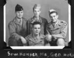 Radar mechanics pose for the camera. Back: Sam Hansen, Vern Martin, and George Wachs. Front: Bill Lesak. In WWII.