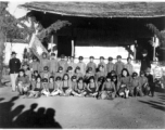 Local school kids pose in courtyard of school in Yunnan province, China, during WWII, at the Songming County Xiaogu Central Elementary School (嵩明县效古中心小学校).