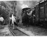 Darjeeling Himalayan Railway (DHR) B Class 2 ft. saddle tank steam locomotive in the mountains, on winding track.