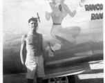 Flyer Walter Wegner poses with B-25J-185-CO bomber "Rangoon Rangler," serial #44-40857. 10th Air Force, 7th Bombardment Group, 9th Bombardment Squadron. The starboard side of the aircraft has "Cactus Kid" artwork.  During WWII.