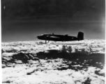 B-25s of the 22nd Bombardment Squadron in flight over SW China or Burma during WWII.